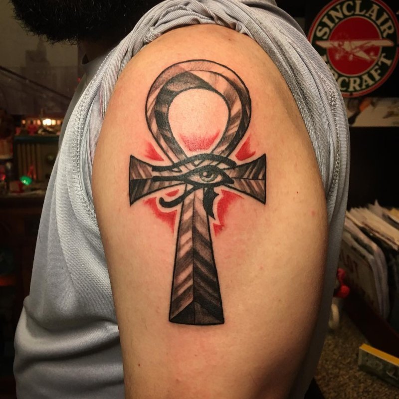 Ankh tattoo on the shoulder for men