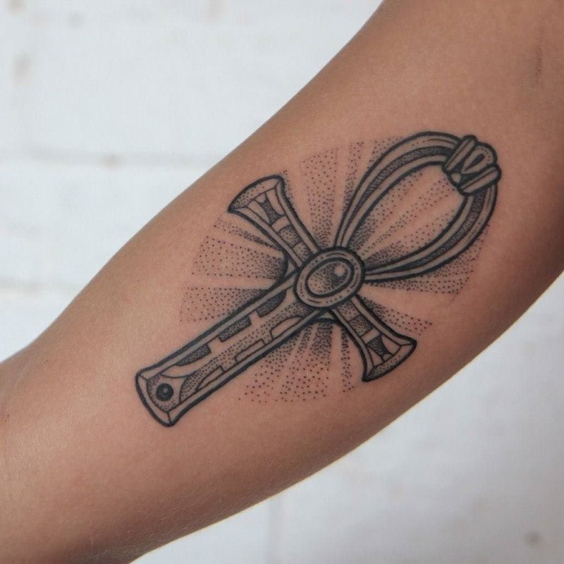 Ankh tattoo on the arm for men