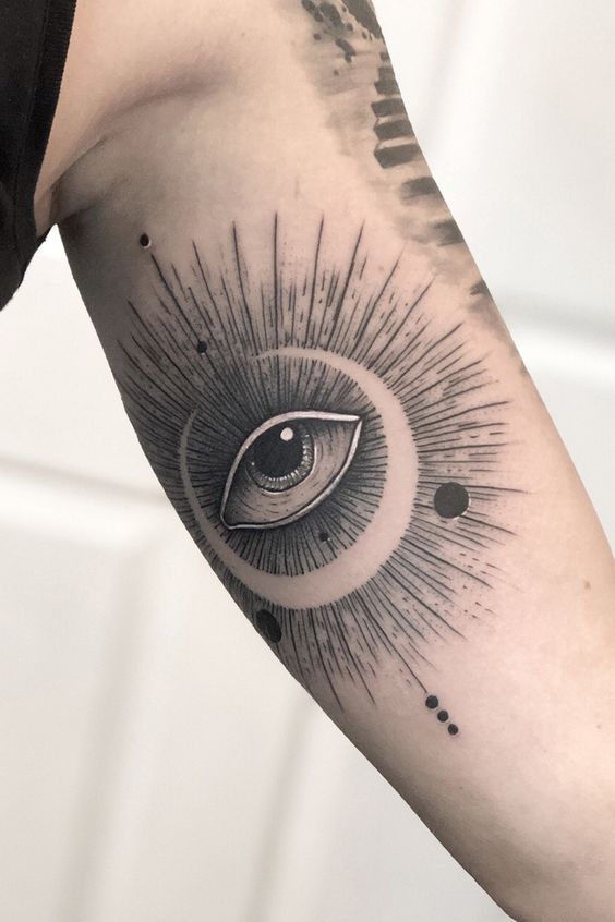 Eye tattoo on bicep for men