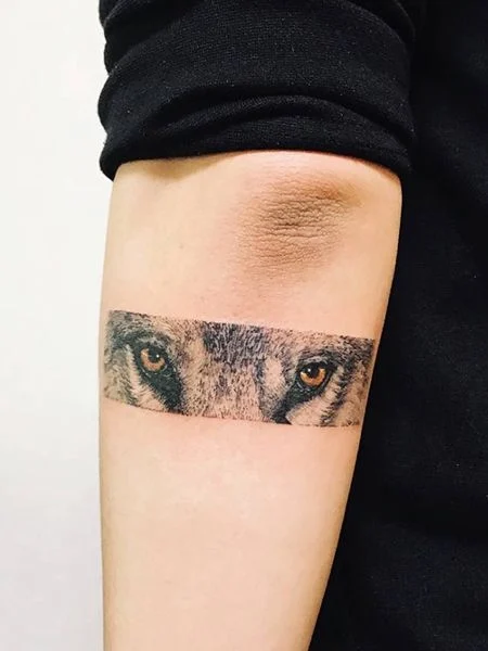 Eye tattoo on forearm for women