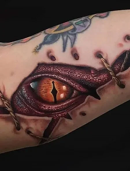 Eye tattoo on arm for men