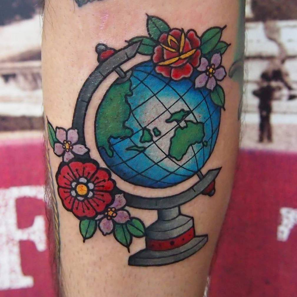 Globe tattoo on leg for men