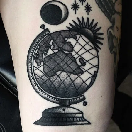 Globe tattoo on the side for men