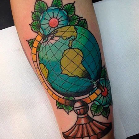 Color globe tattoo on forearm for men