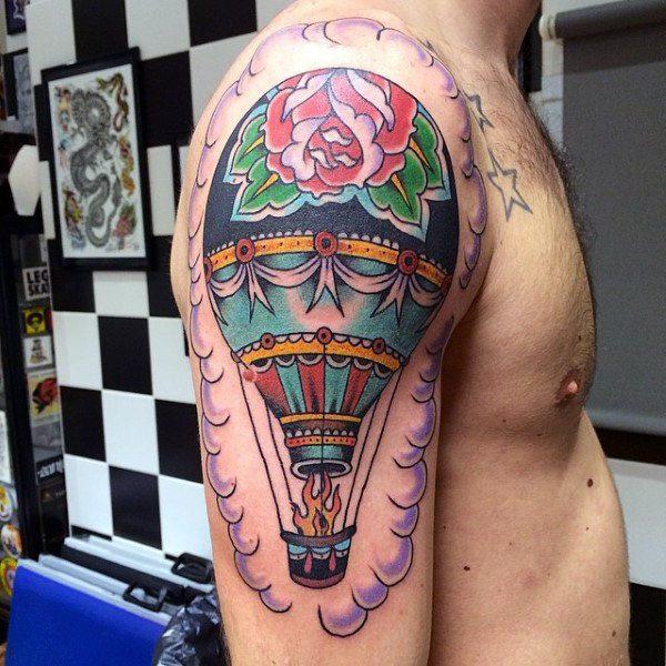 Large balloon tattoo on the shoulder for men