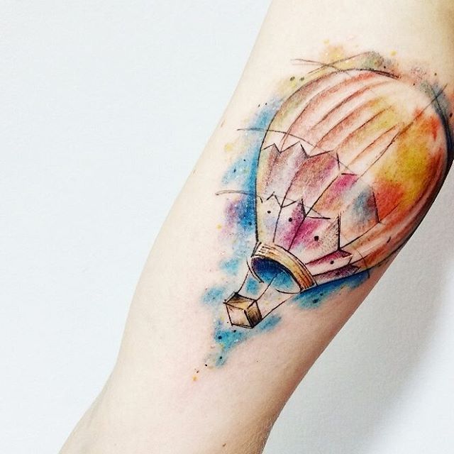 Balloon tattoo on the shoulder for men