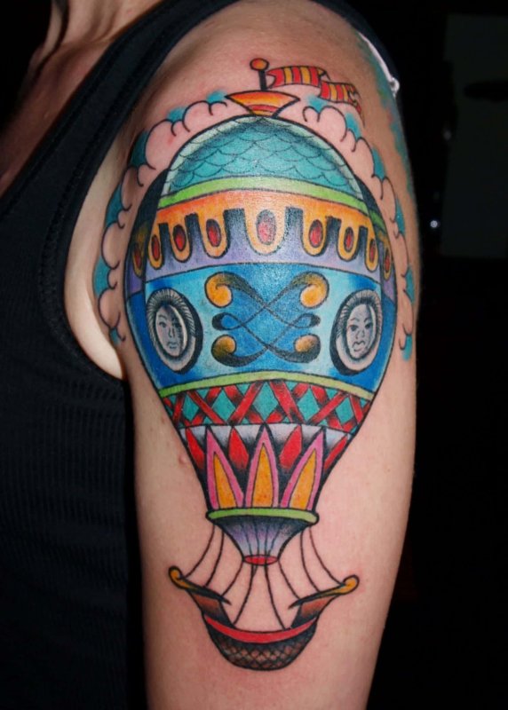 Balloon tattoo on the shoulder for men