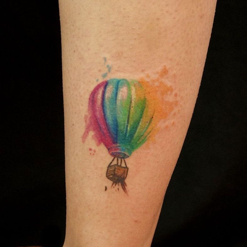 Balloon tattoo on the arm for men