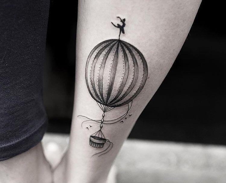 Balloon tattoo on calf for men