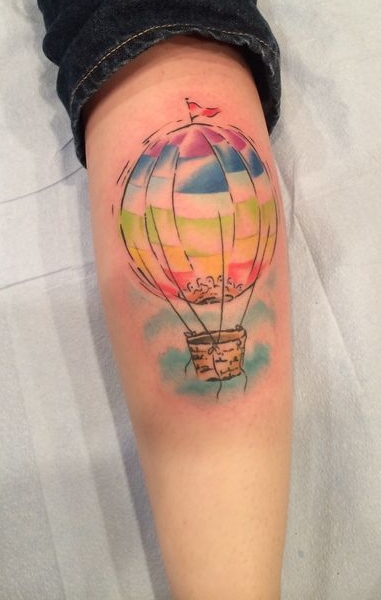 Balloon tattoo on the calf for men