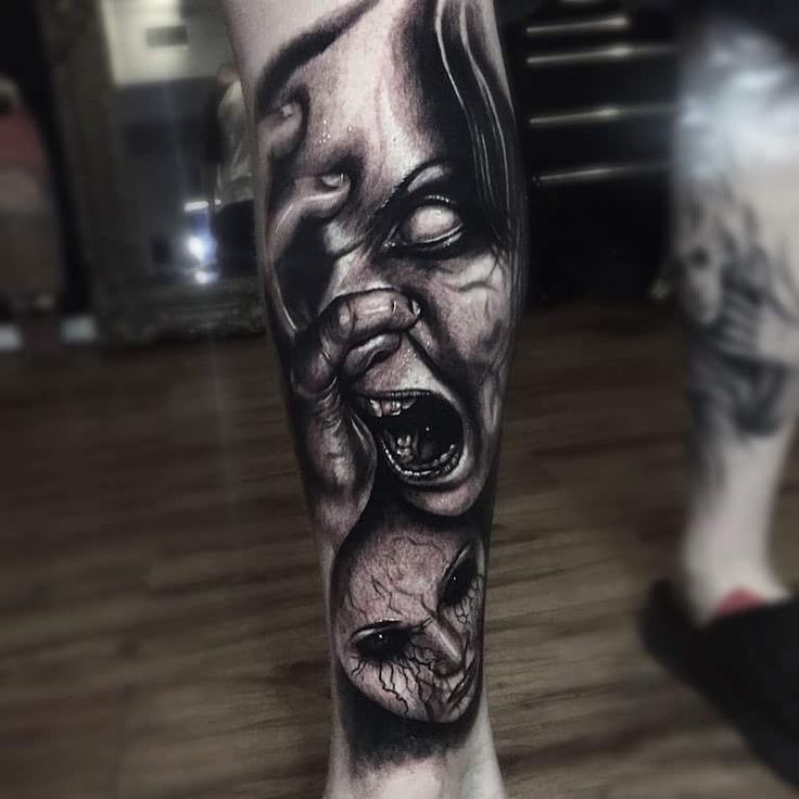 Horror style tattoo on the shin for women