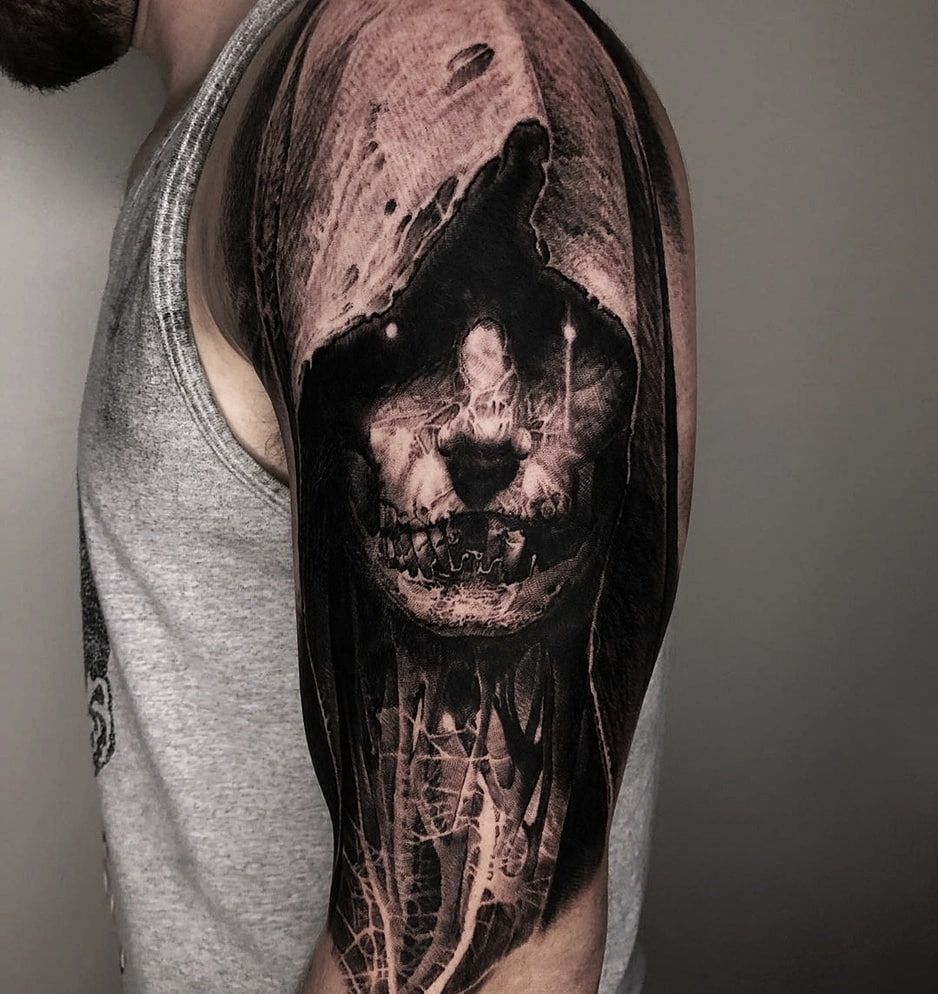 Horror style shoulder tattoo for men