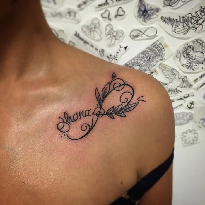 Infinity tattoo on collarbone for women