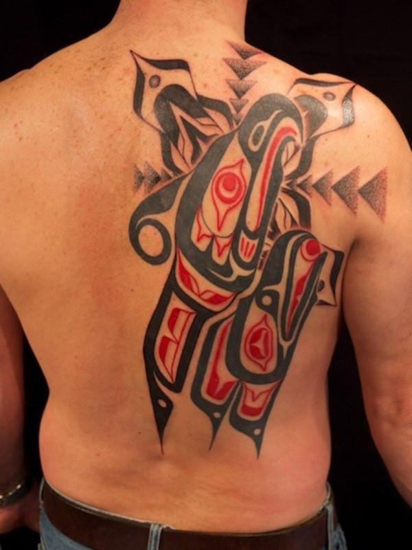 Hyde style tattoo on the back for men