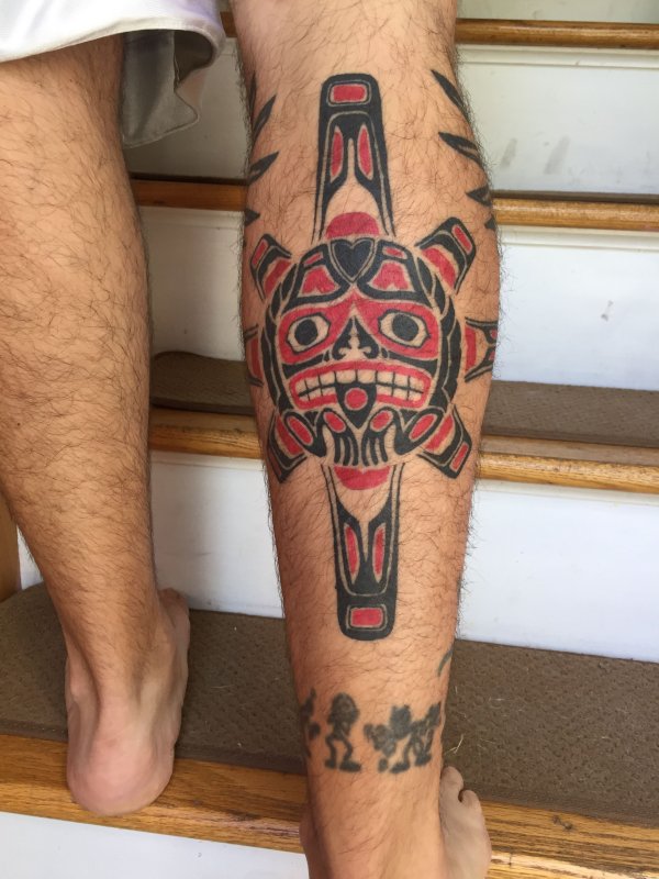 Hyde style tattoo on the calf for men