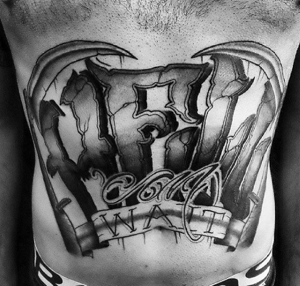 Lettering style tattoo on the stomach for men