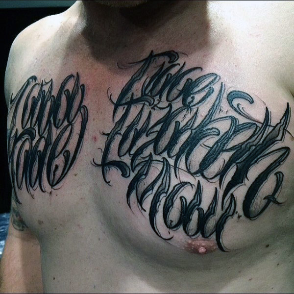 Lettering style tattoo on the chest for men