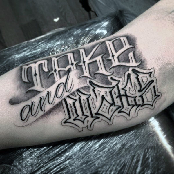 Lettering style tattoo on the arm for men