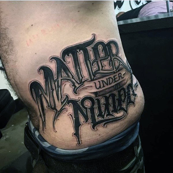 Lettering style tattoo on the side for men