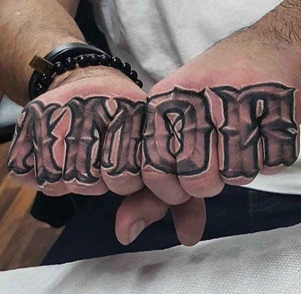 Lettering style tattoo on the hand for men