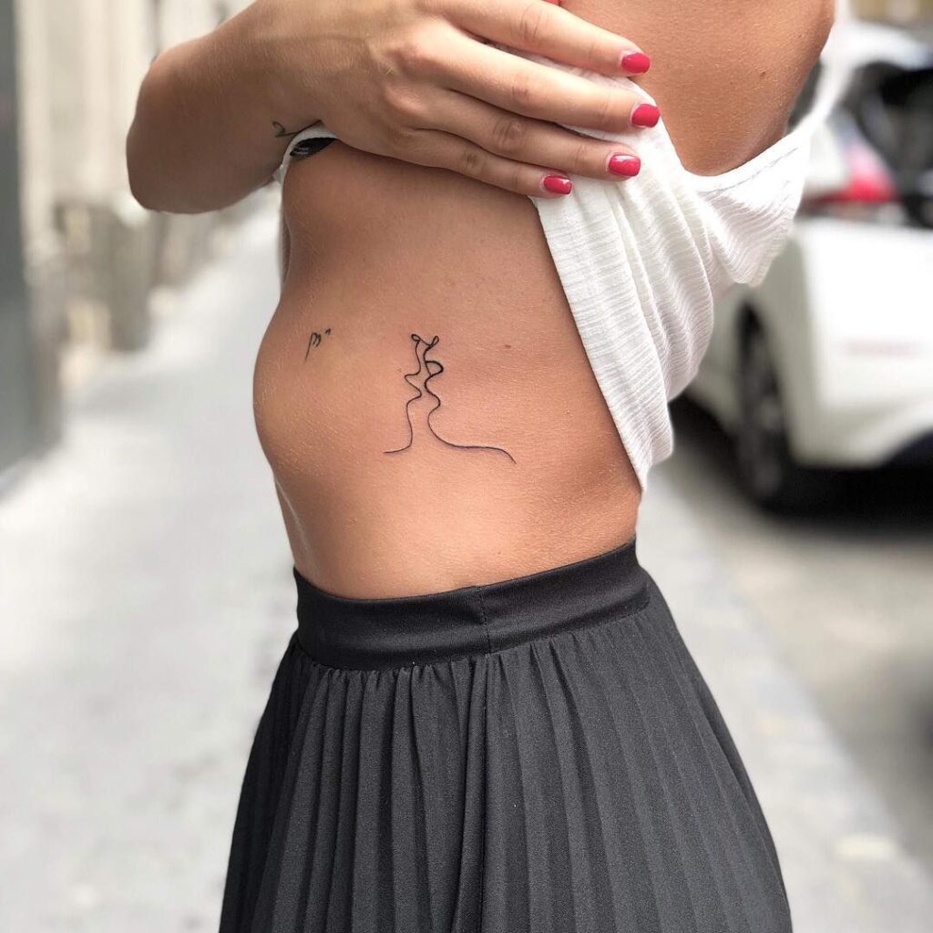 Minimalist tattoo on the side for women