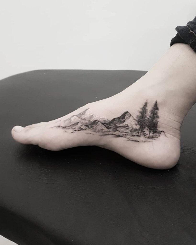 Mountain tattoo on ankle for women