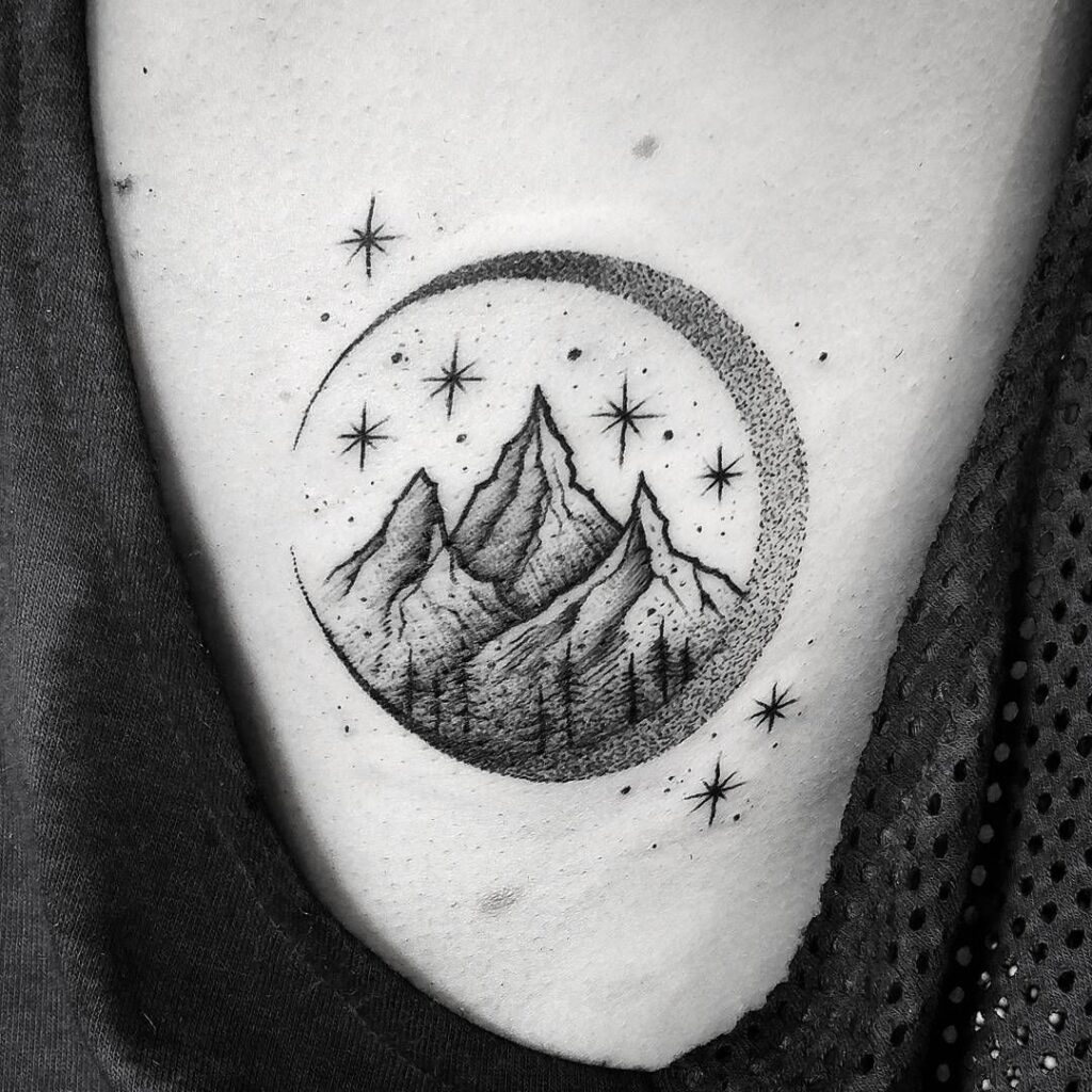 Mountain tattoo on the side for men