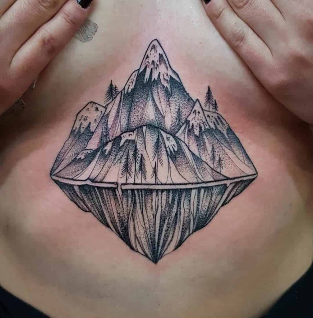 Mountain tattoo on stomach for women