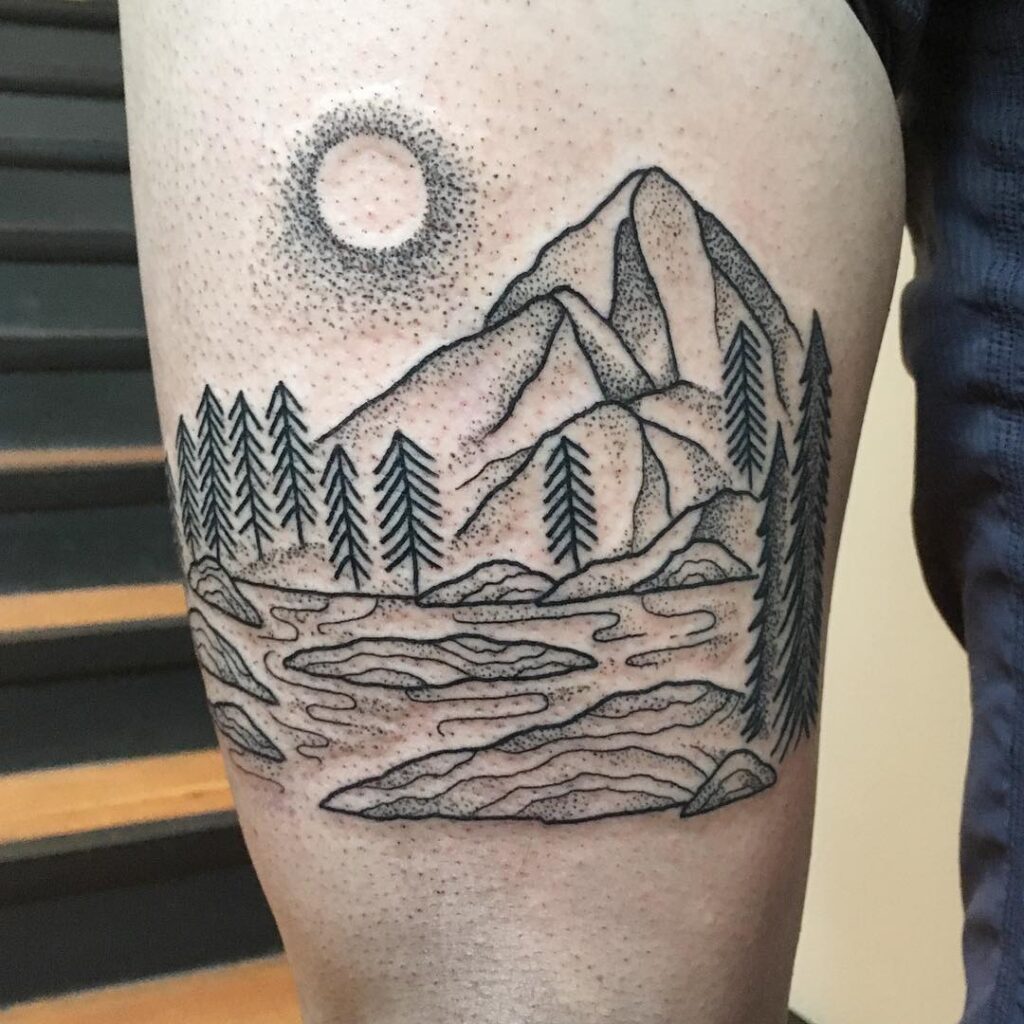 Mountain tattoo on thigh for men