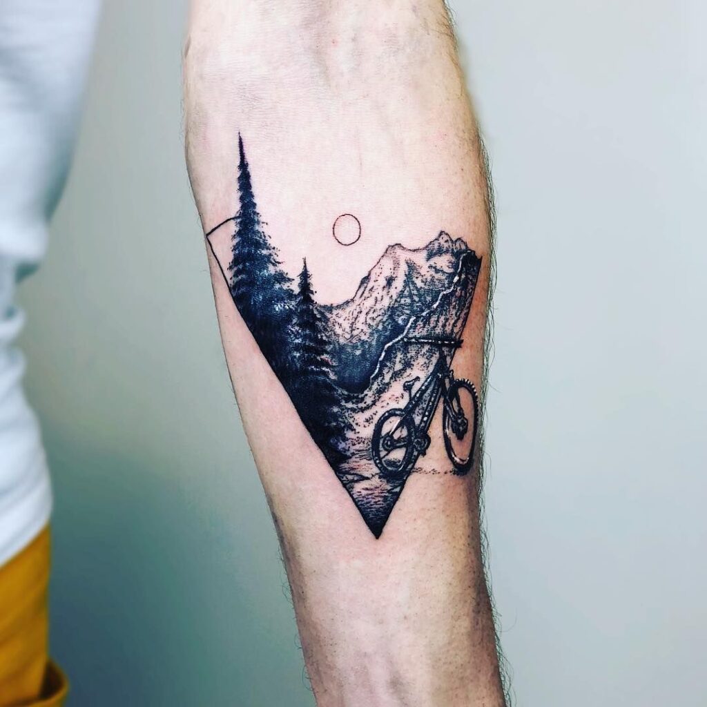 Mountain tattoo on forearm for men