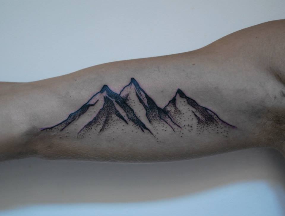 Mountain tattoo on the shoulder for men