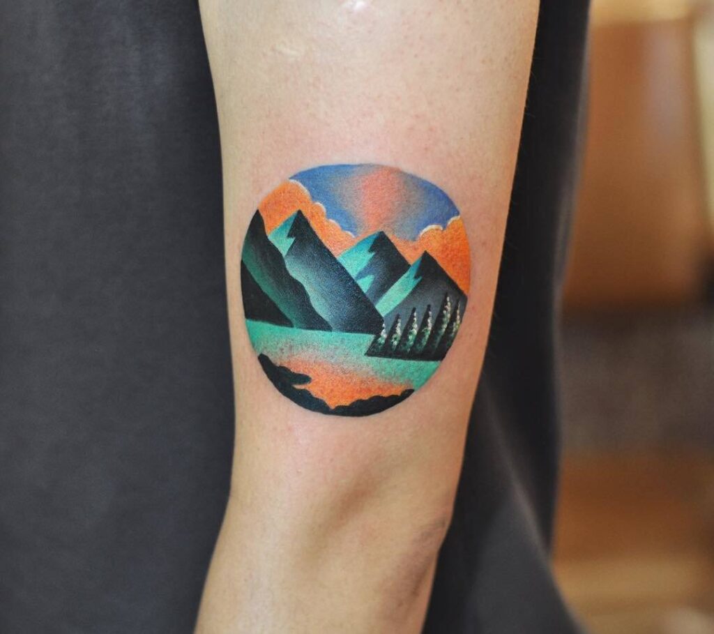 Mountain tattoo on the shoulder for men