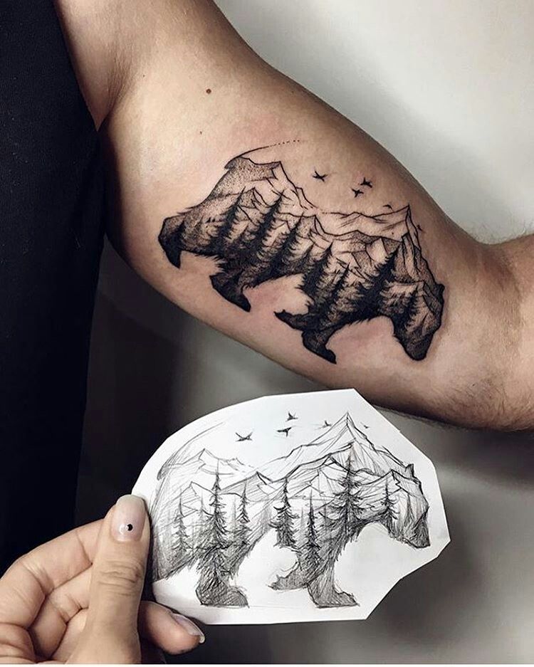 Mountain tattoo on the shoulder for men