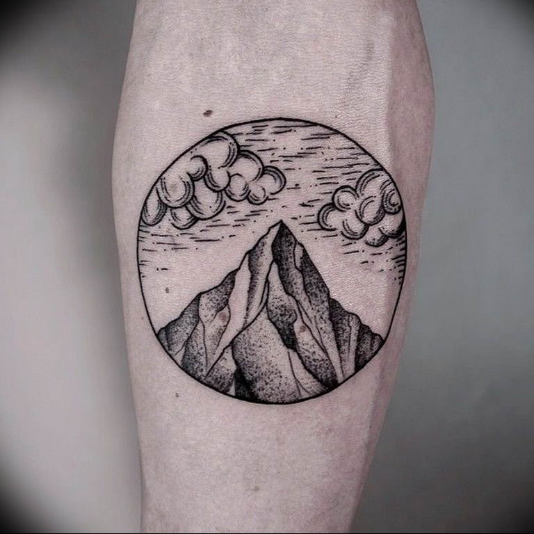 Mountain tattoo on forearm for men