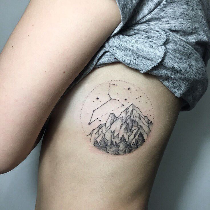 Mountain tattoo on the side for women