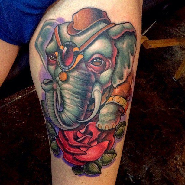 New-school style elephant tattoo on the hip for men