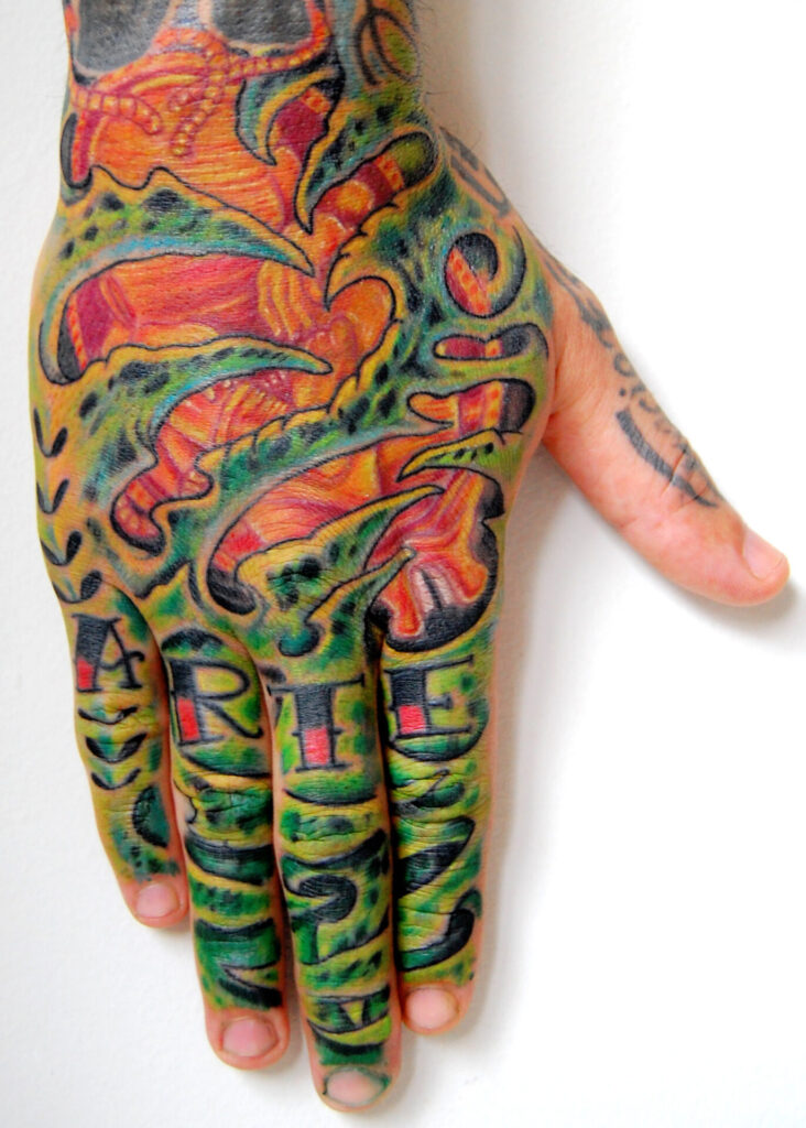 Organic style tattoo on the hand for men