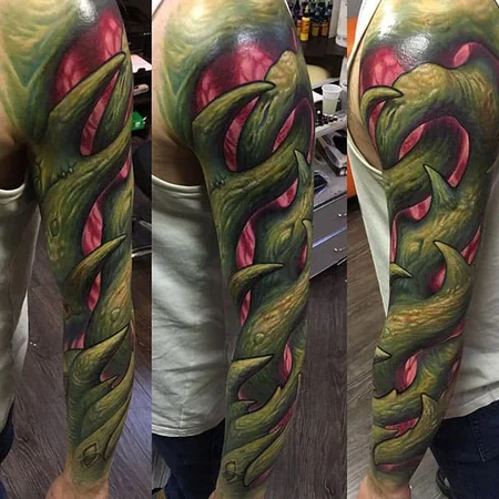 Organic color tattoo on the arm for men