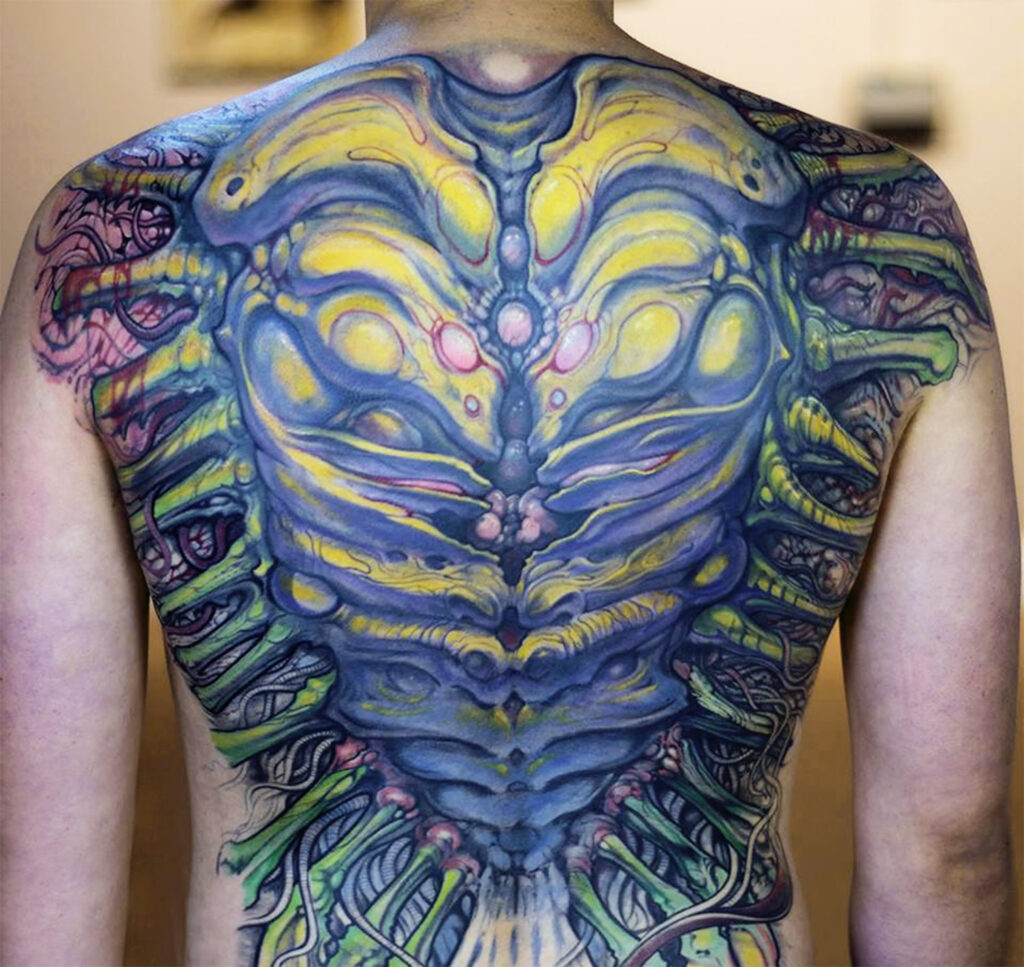 Large organic style tattoo on the back for men