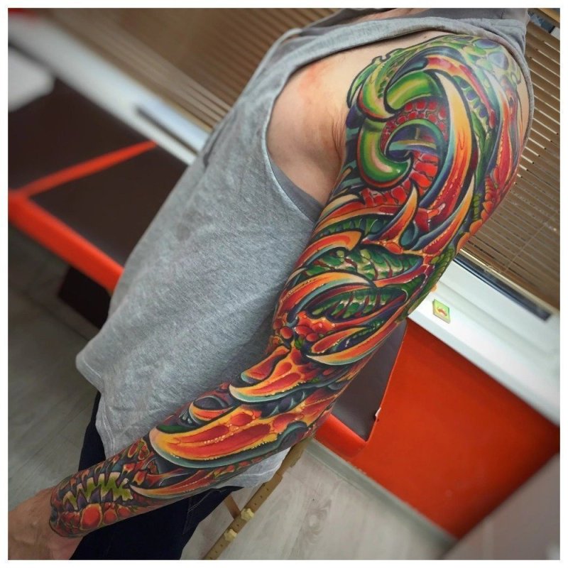 Organic color tattoo on the arm for men