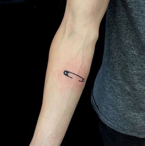 Pin tattoo on forearm for men