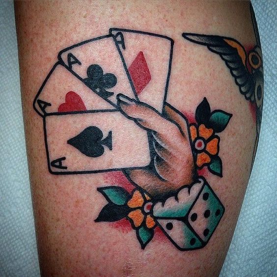 Colorful playing cards tattoo on shin for women