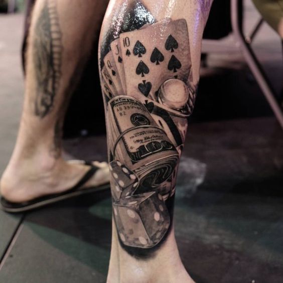 Tattoo of playing cards on the shin for men