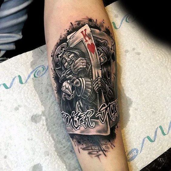 Tattoo of playing cards on the arm for men