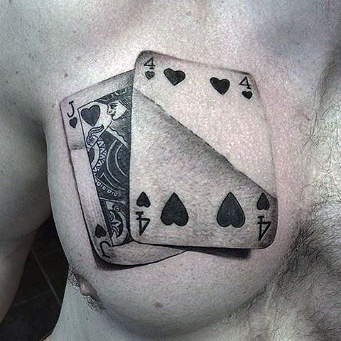 Tattoo of playing cards on chest for men