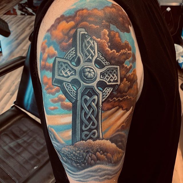 Color celtic cross tattoo on shoulder for men