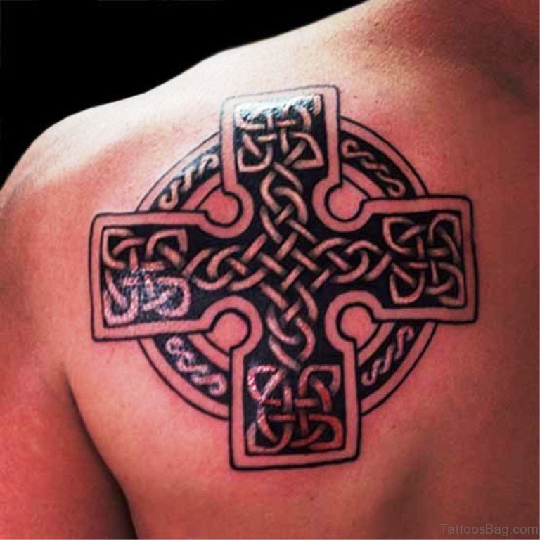 Celtic cross tattoo on the shoulder blade for men