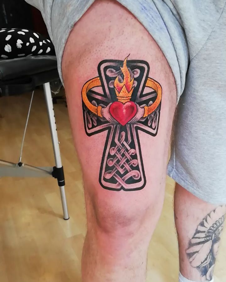 Celtic cross tattoo on thigh for men