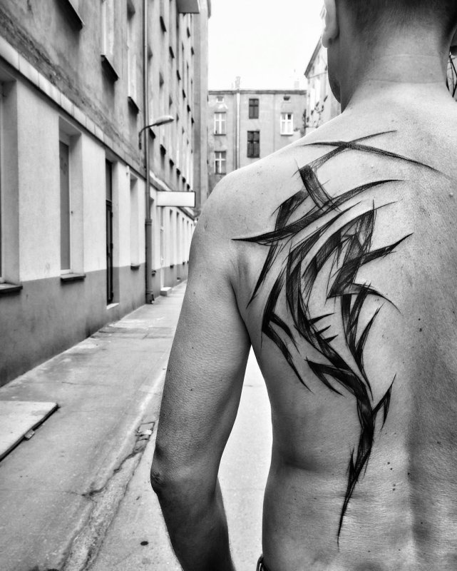 Sketch style shark tattoo on the shoulder blade for men