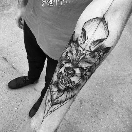 Sketch style wolf tattoo on forearm for men